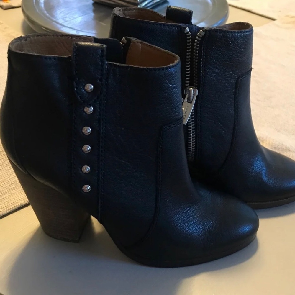 Black leather coach booties
